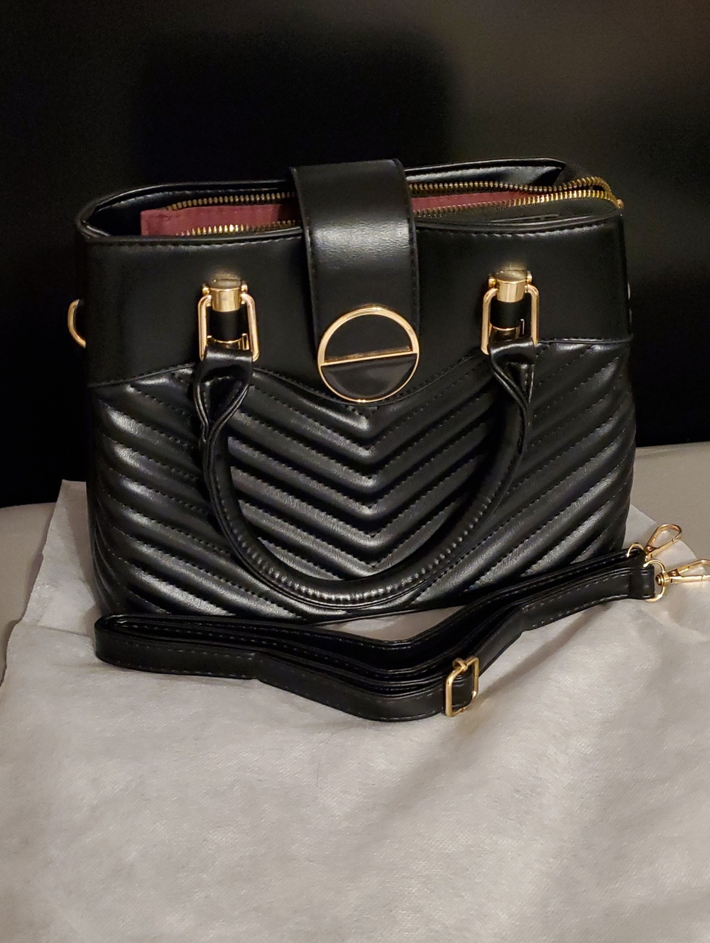 Black Quilted Satchel Handbag with Gold Hardware